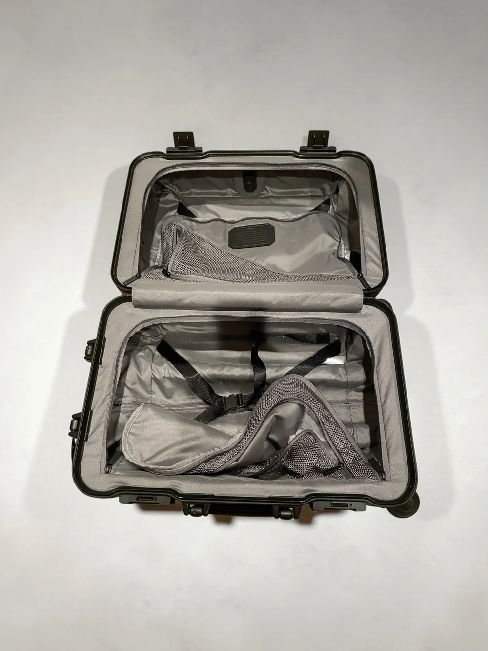 Tumi Black Diagonal-Rib Hard-Shell Spinner Carry-On